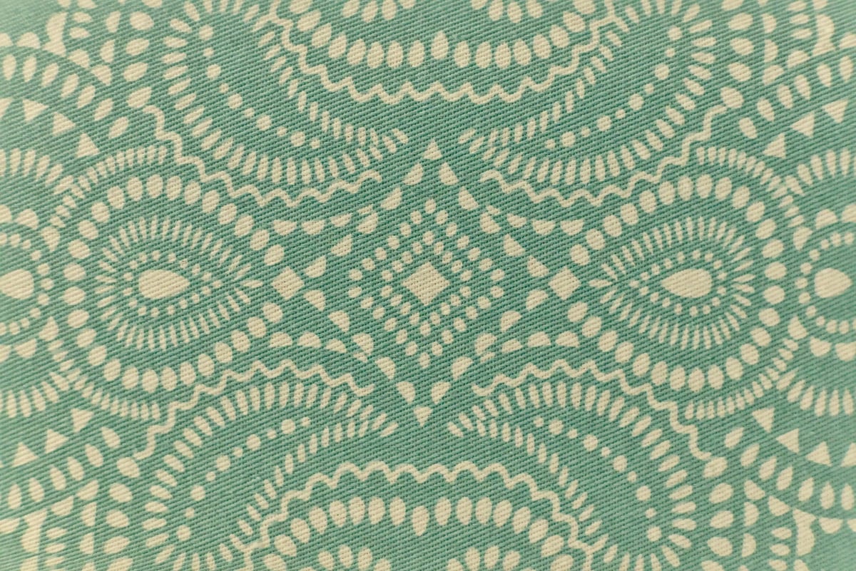 Turquoise fabric with a large geometric pattern